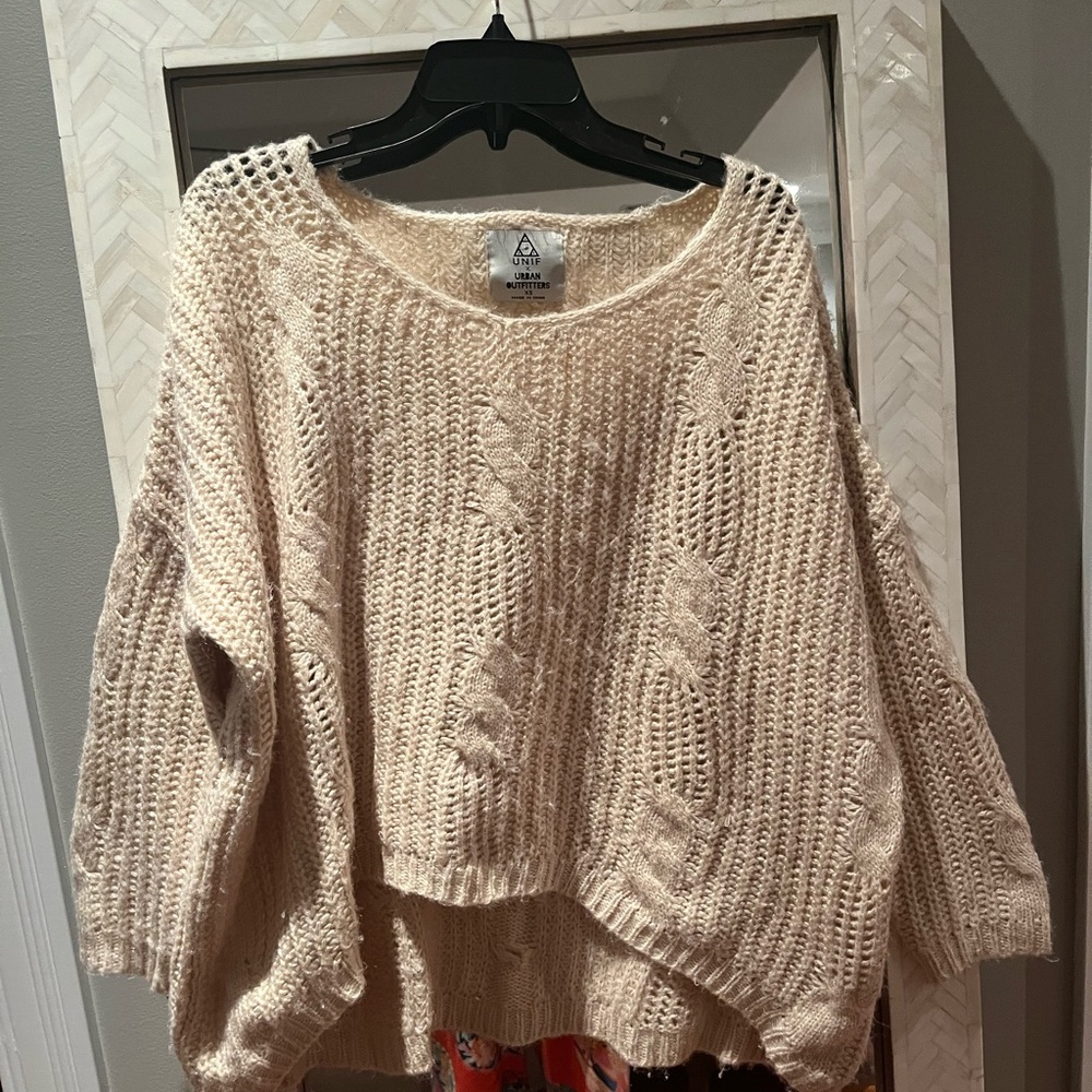 Brand: Urban outfitters Size: XS Style. Cute high low knit ivory sweater